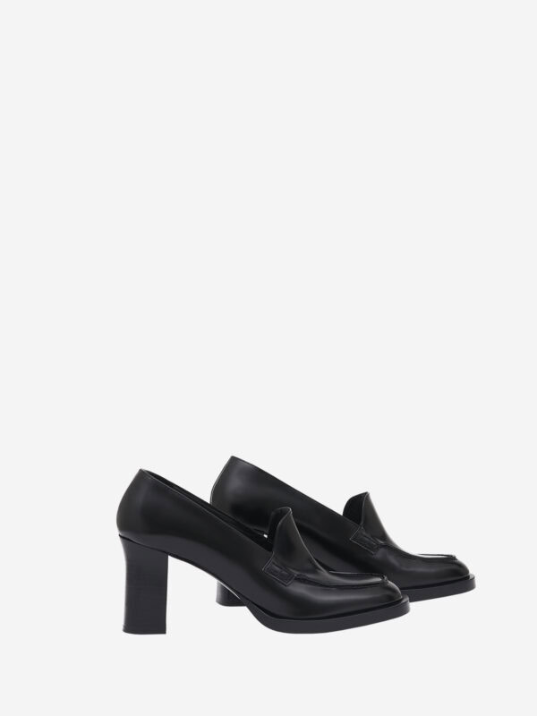 Moccasin-style pumps with chunky heel and leather sole