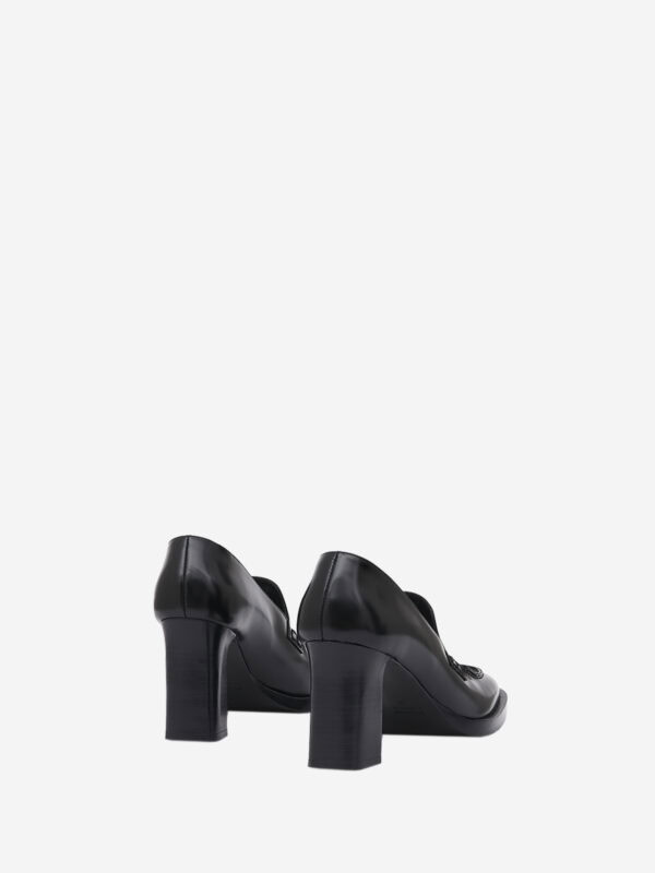 Moccasin-style pumps with chunky heel and leather sole