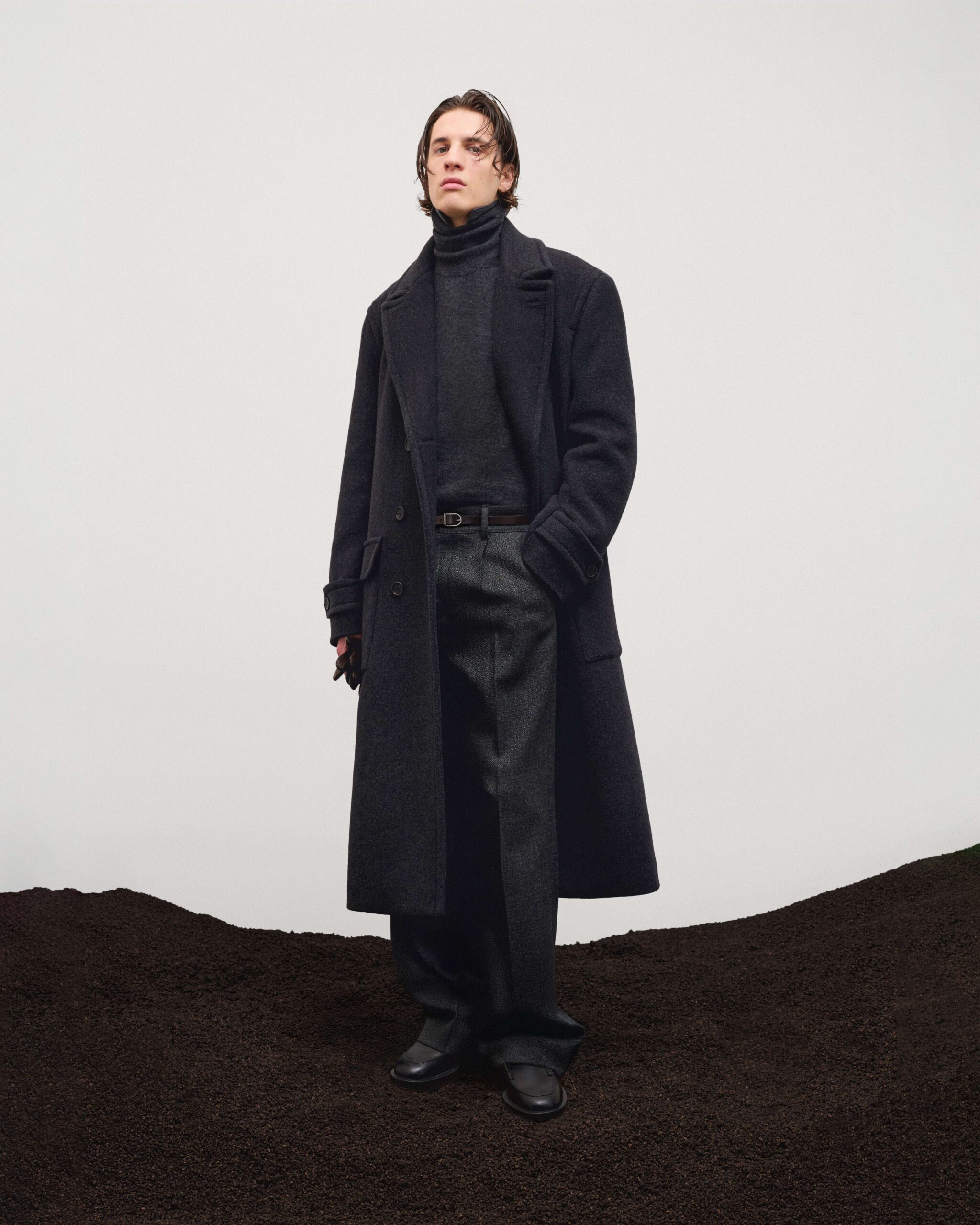 Full-length charcoal wool coat over turtleneck and belted tailored trousers, menswear, Durazzi Milano FW26