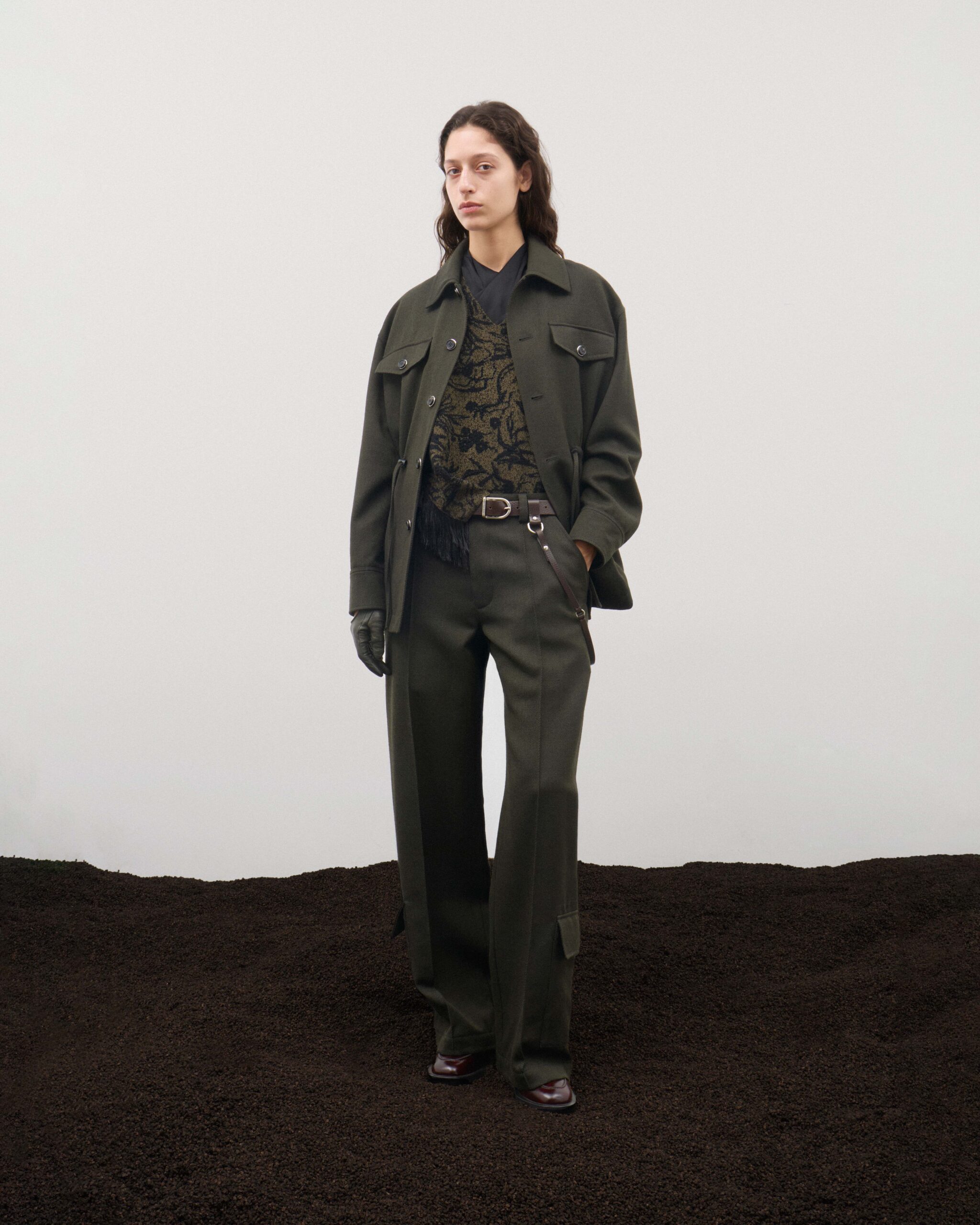 Olive overshirt jacket over floral jacquard top with belted wool trousers, Durazzi Milano FW26