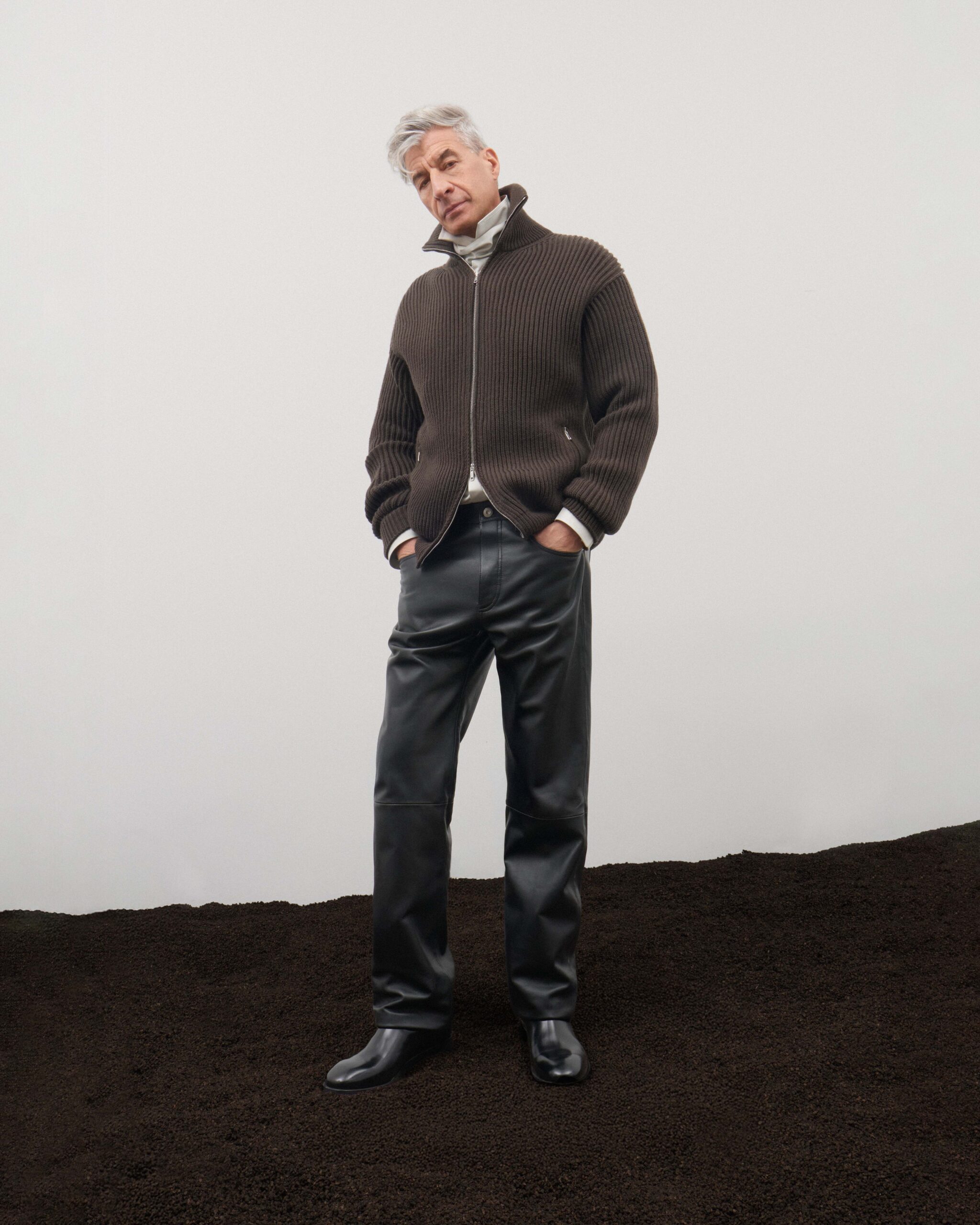 Brown ribbed knit zip cardigan with black leather trousers and black leather ankle boots, menswear, Durazzi Milano FW26